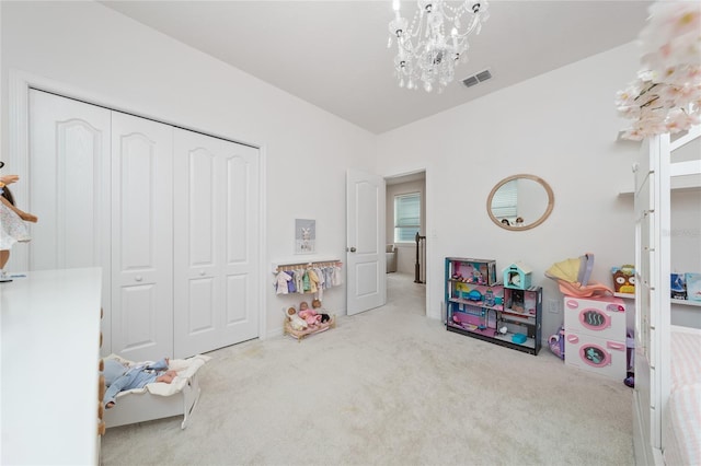 recreation room featuring a notable chandelier and light colored carpet