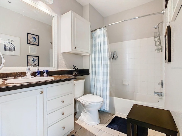 full bathroom featuring tile patterned flooring, vanity, shower / tub combo with curtain, and toilet