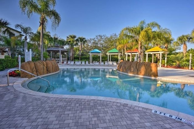 view of pool with a gazebo and a patio area