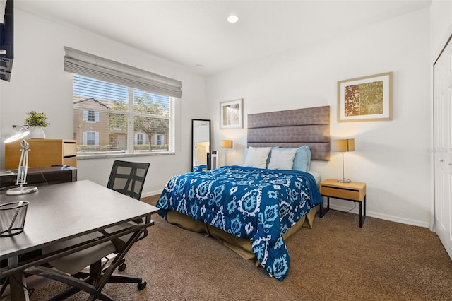 carpeted bedroom featuring a closet