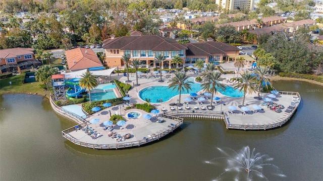 drone / aerial view with a water view