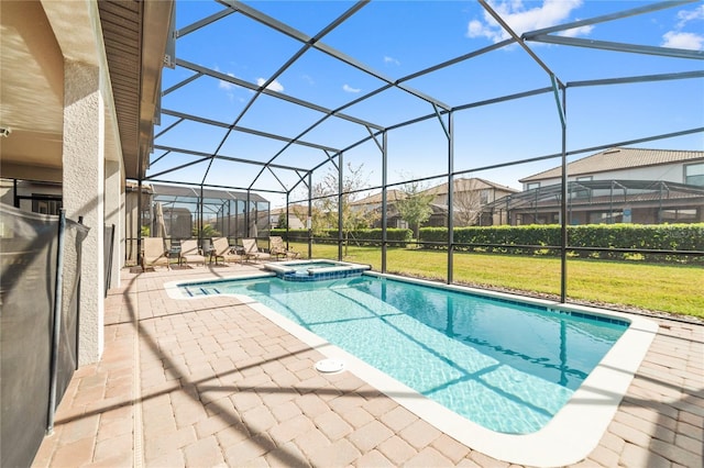 view of pool featuring glass enclosure, an in ground hot tub, a yard, and a patio