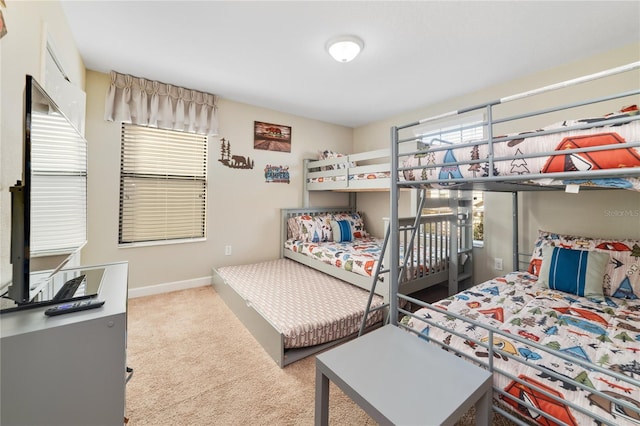 bedroom featuring carpet