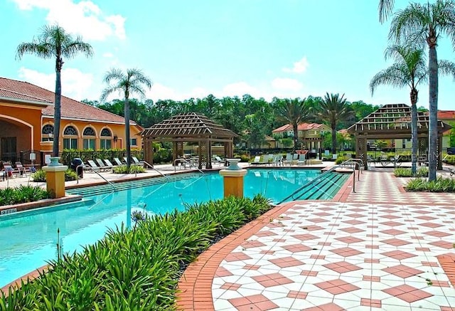 view of swimming pool with a gazebo