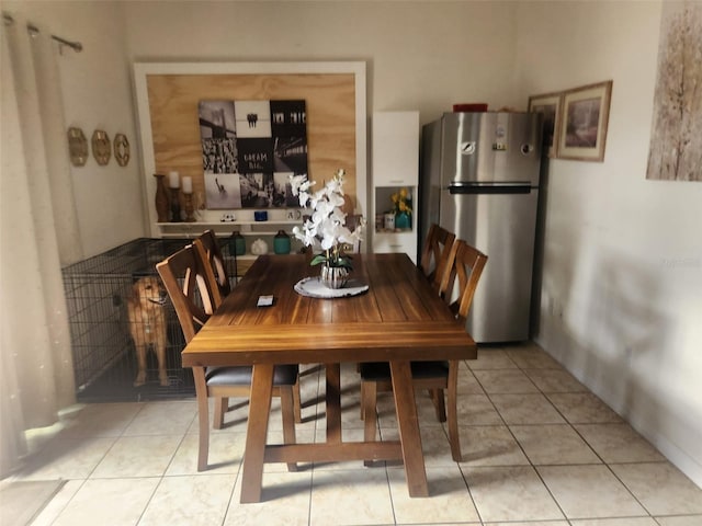 dining room with light tile patterned floors