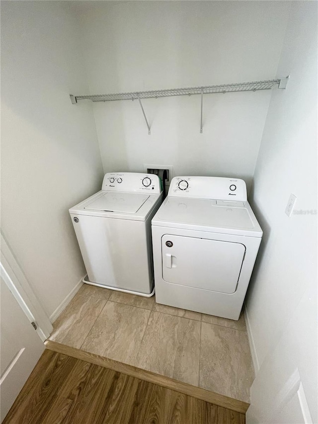 laundry room featuring independent washer and dryer