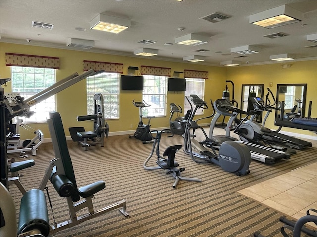 exercise room with crown molding