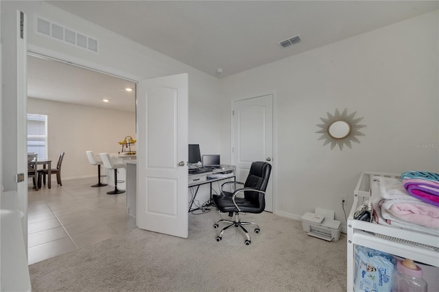 home office featuring light tile patterned flooring