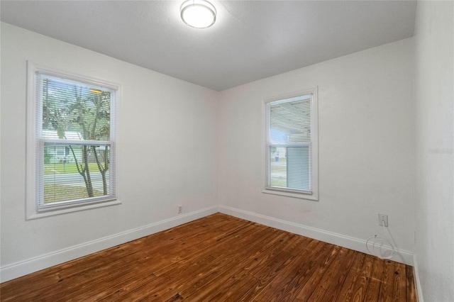 empty room featuring hardwood / wood-style floors