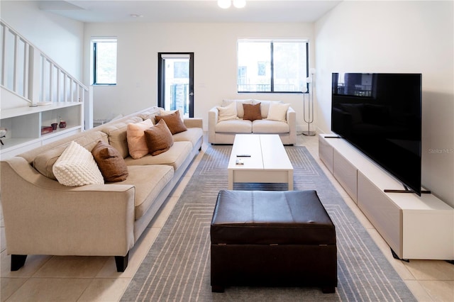 living room with light tile patterned floors