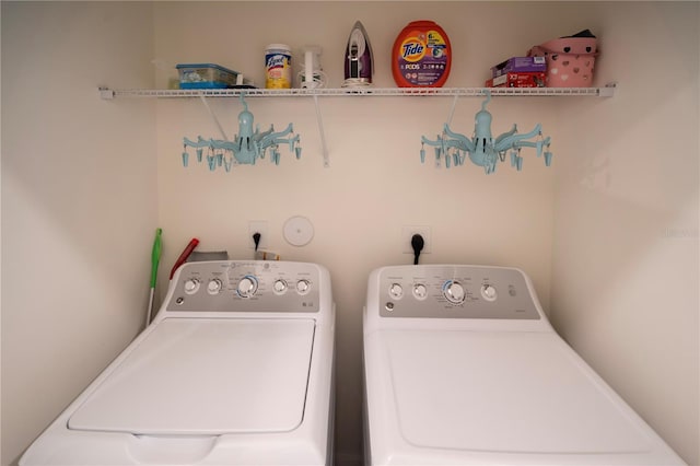 washroom with washer and clothes dryer