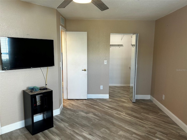 bedroom featuring ceiling fan and hardwood / wood-style flooring