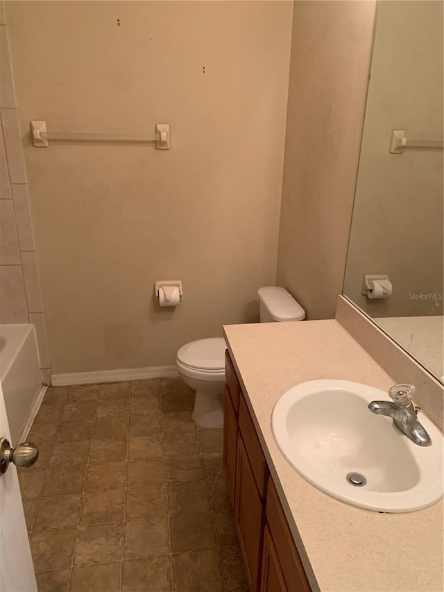 full bathroom with vanity, toilet, and independent shower and bath