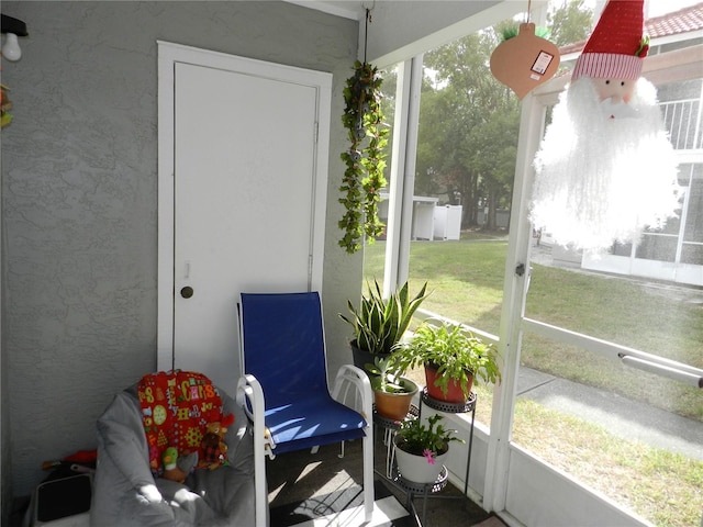 sunroom with plenty of natural light