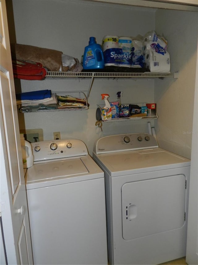 laundry room featuring independent washer and dryer