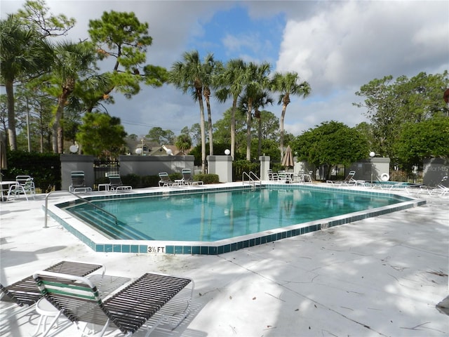 view of pool featuring a patio area