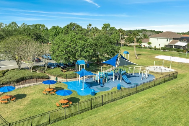 view of jungle gym with a lawn