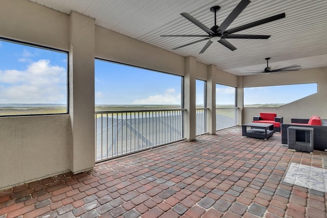 820 Windlass Ct, Kissimmee, FL 34746 - unfurnished sunroom featuring a water view