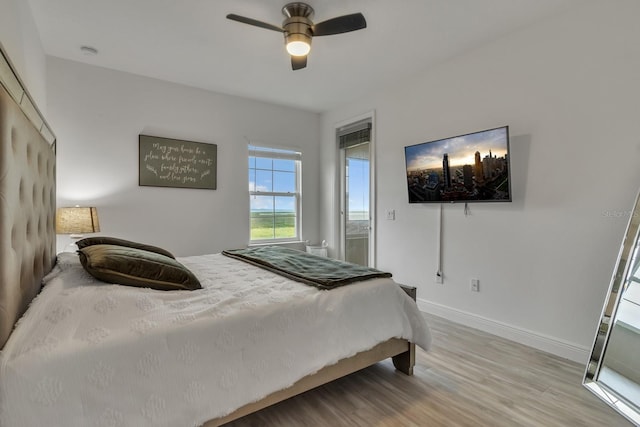 820 Windlass Ct, Kissimmee, FL 34746 - bedroom with ceiling fan, baseboards, and wood finished floors