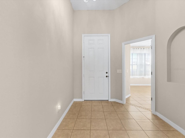 interior space with light tile patterned floors