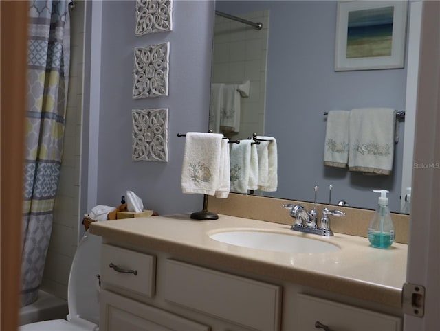 bathroom featuring vanity and shower / tub combo