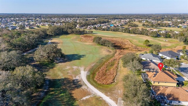 bird's eye view with view of golf course