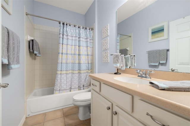 bathroom with shower / bath combo, vanity, toilet, and tile patterned floors