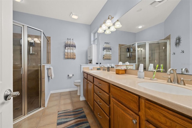 full bathroom with double vanity, a stall shower, visible vents, and a sink