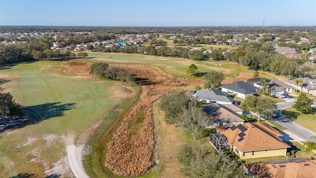 aerial view featuring a residential view and golf course view