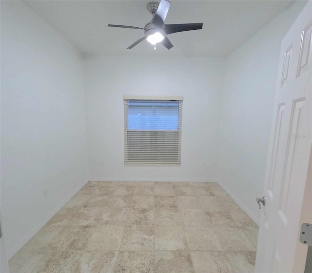 spare room featuring ceiling fan