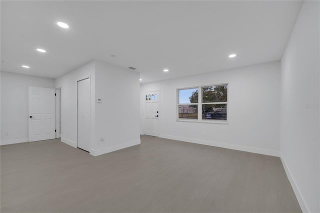 spare room featuring hardwood / wood-style floors