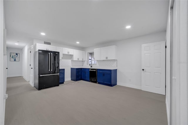 kitchen featuring blue cabinets, sink, black appliances, decorative backsplash, and white cabinets