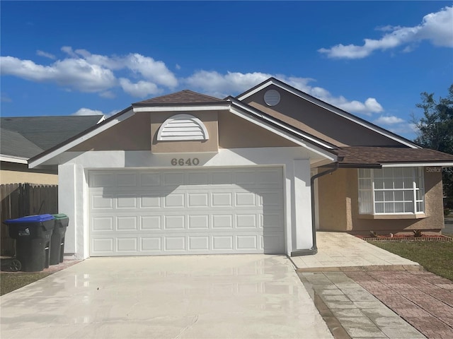 ranch-style home with a garage