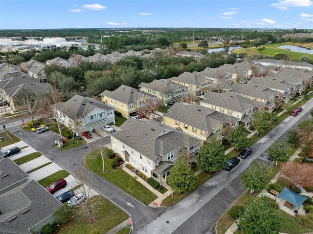 aerial view featuring a water view and a residential view