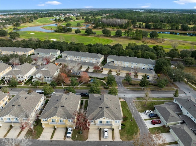 birds eye view of property featuring a residential view, golf course view, and a water view