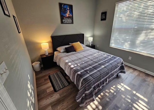 bedroom featuring hardwood / wood-style floors