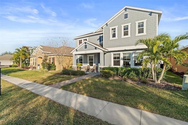 view of front of home featuring a front lawn