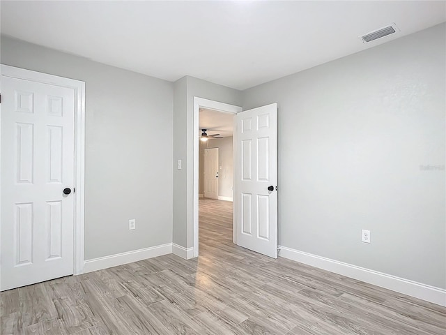 unfurnished bedroom featuring light hardwood / wood-style floors