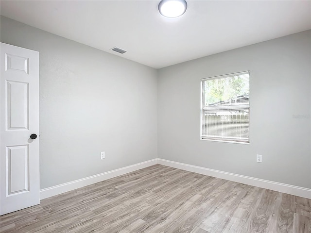 empty room featuring light hardwood / wood-style floors