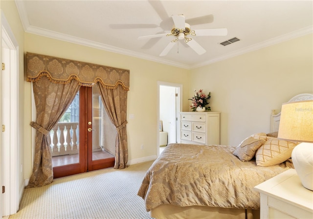 carpeted bedroom with ceiling fan, french doors, and ornamental molding