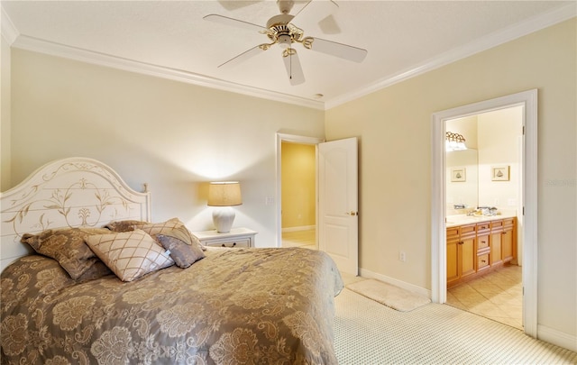 carpeted bedroom with ensuite bathroom, ceiling fan, and ornamental molding