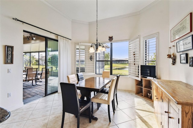 dining area with light tile patterned floors and a healthy amount of sunlight