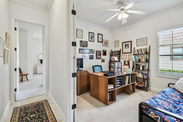 carpeted office space with ceiling fan and ornamental molding