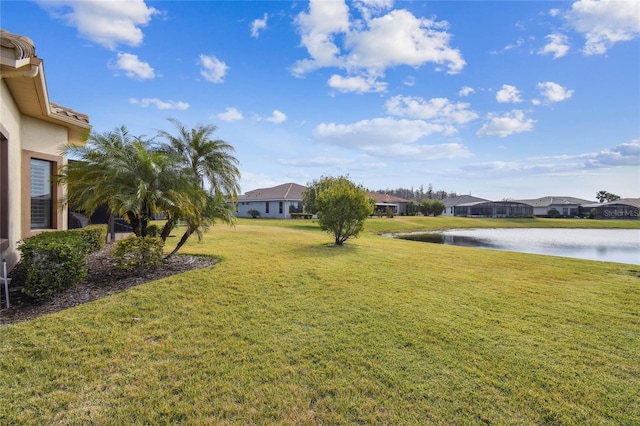 view of yard with a water view