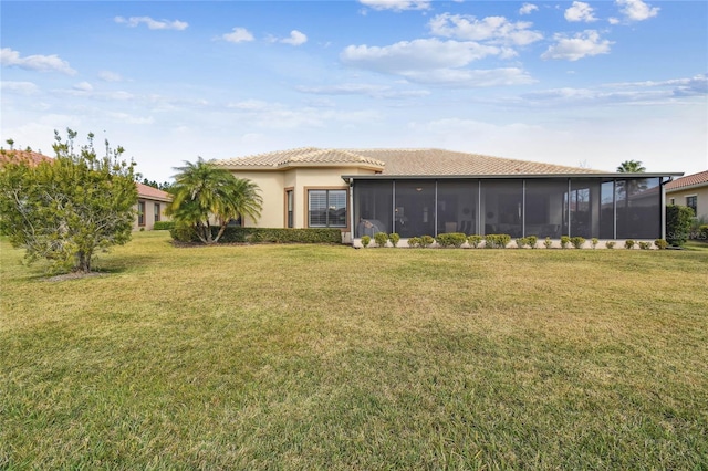 view of yard featuring a sunroom