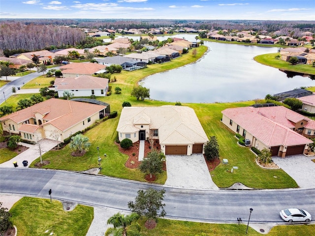 drone / aerial view with a water view