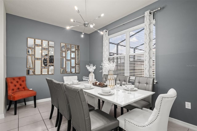 1607 Kona Ln, Davenport, FL 33897 - tiled dining space featuring a chandelier and baseboards