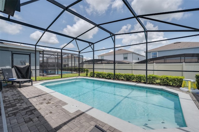 1607 Kona Ln, Davenport, FL 33897 - view of pool featuring a patio area and a lanai