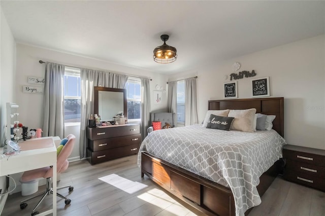 bedroom featuring light wood-type flooring