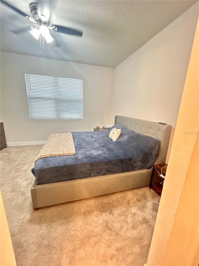 bedroom featuring carpet flooring and ceiling fan